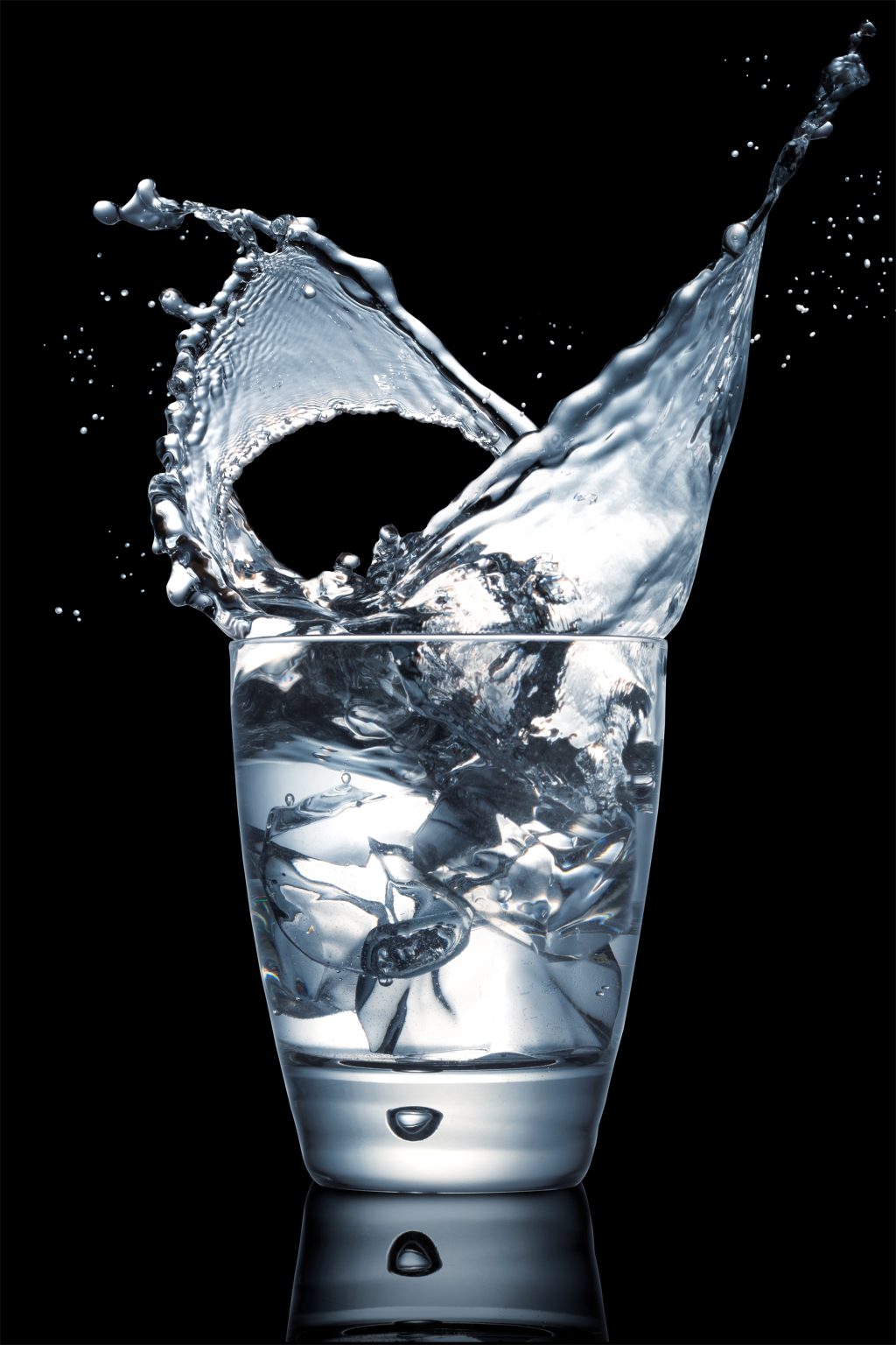 Water splashing out of a glass